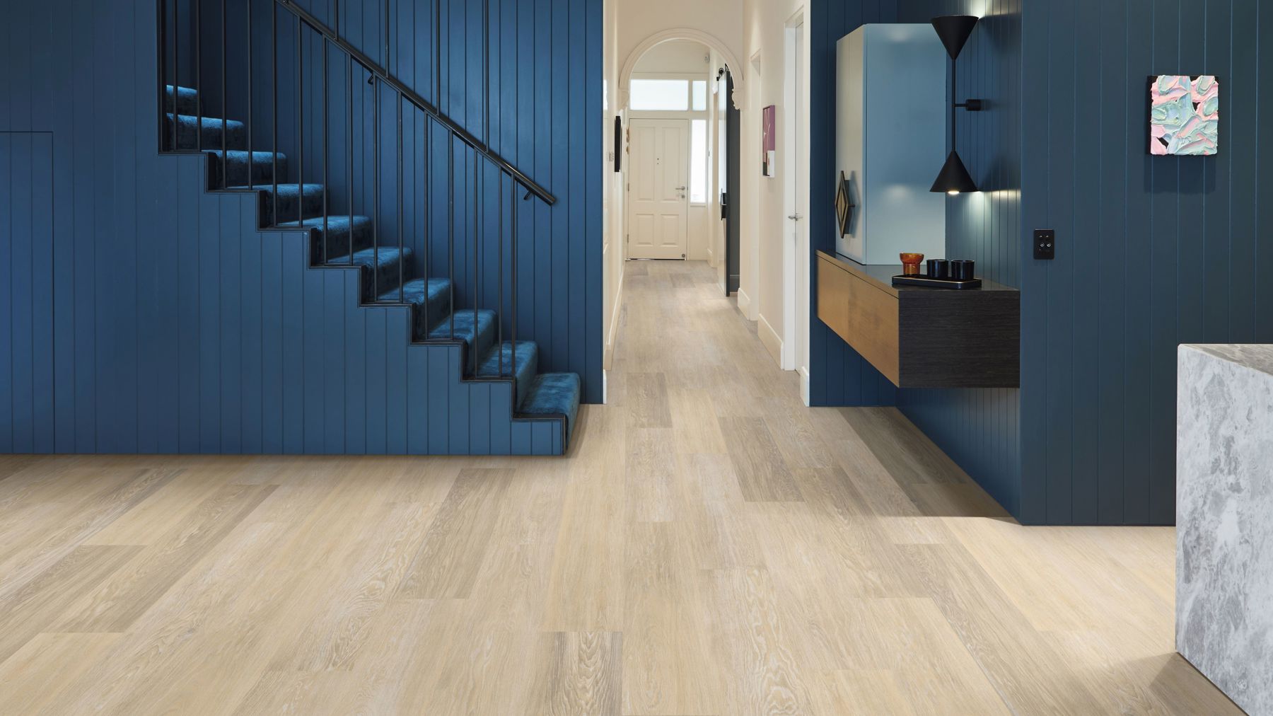Sophisticated allure defines the hallway with luxury vinyl.