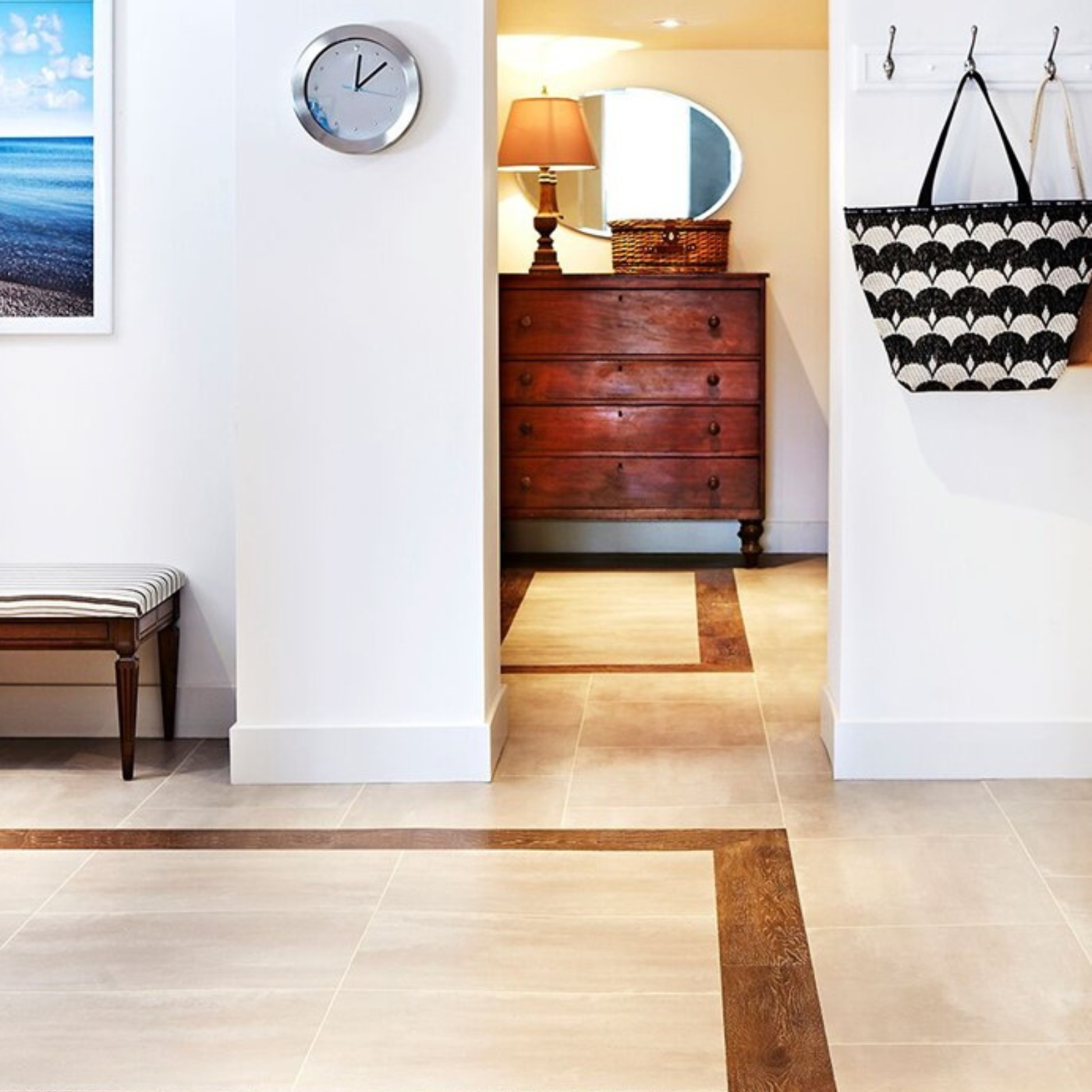 Peter Fallico used oak lvt to create a border in a hallway with Terra floors