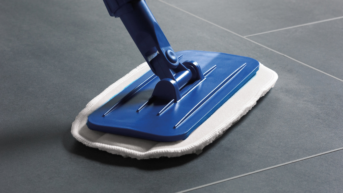 Cleaning mop on floor