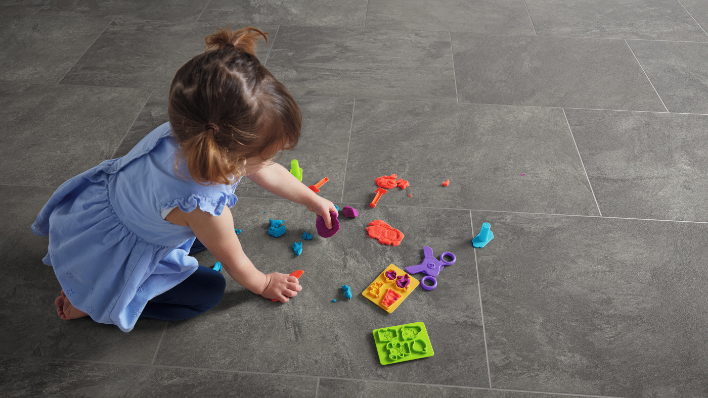 Little girl playing on a Volcanic Slate RKT3001-G floor