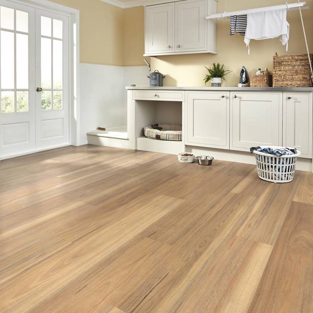 Weathered spotted gum click lvt flooring in a utility room