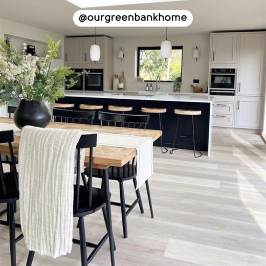 Texas White Ash RKP8105 floors in a white kitchen with a black island; photo credit: @ourgreenbankhome